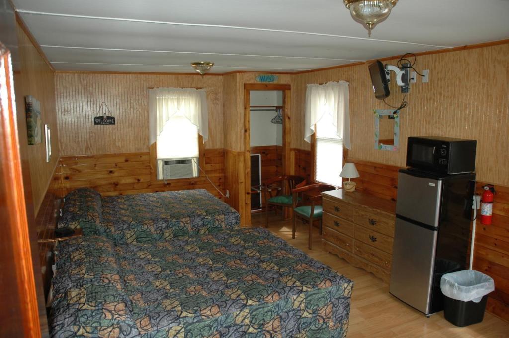 Channel Waterfront Cottages Вейрс-Бич Номер фото
