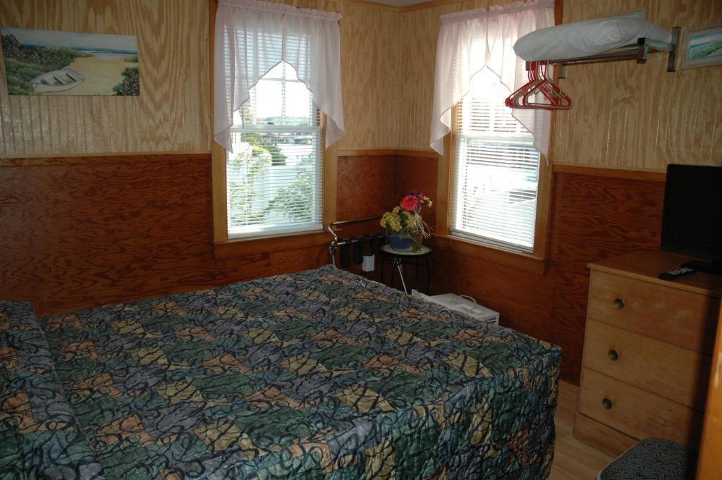 Channel Waterfront Cottages Вейрс-Бич Номер фото